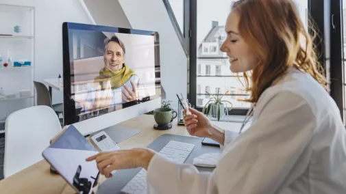 doctor and patient in video consultation doctor and patient in video consultation